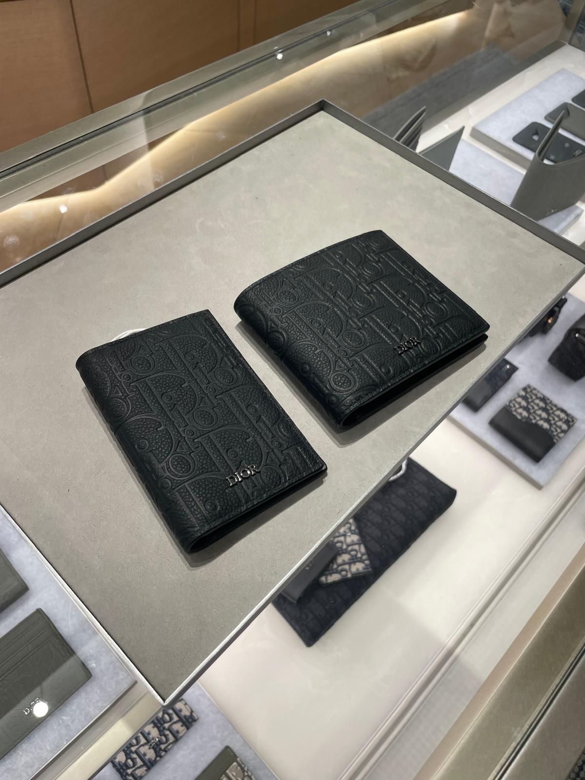 Dior Men's black embossed leather wallets